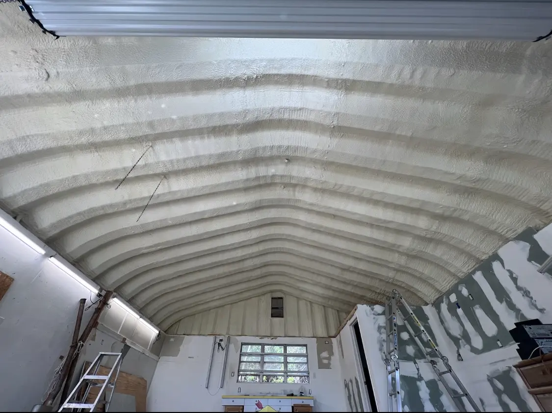 Spray polyurethane foam applied to the underside of a metal roof deck in South Union